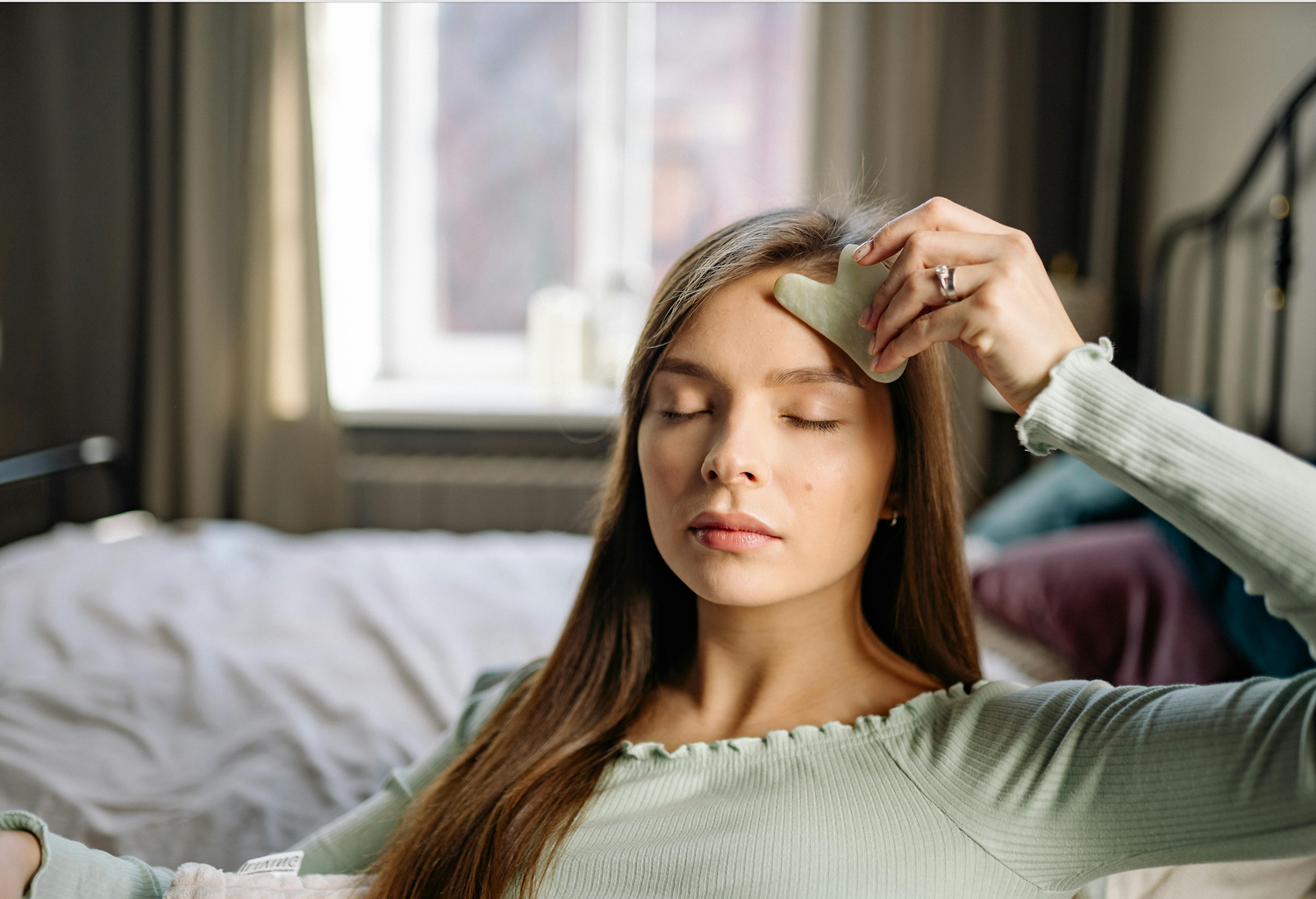 Gha Sha Anwendung im Gesicht